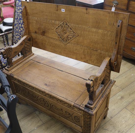 An oak monks bench, W.107cm